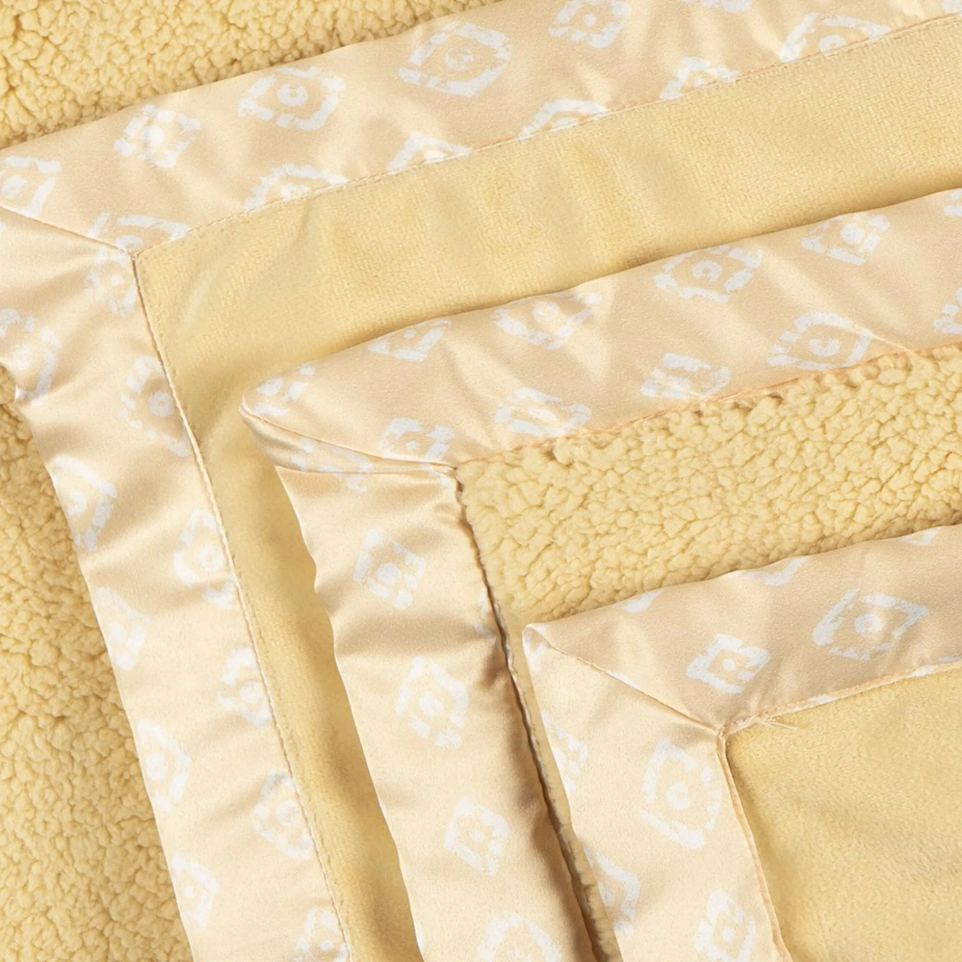 Embroidered Geo Trim Plush Blanket